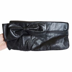 *2 for $10* Black Clutch- Le Chateau